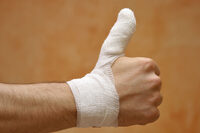 image of a bandaged hand and thumb