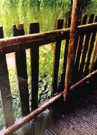 Photo shows the gap in a fence where the four-year-old girl fell