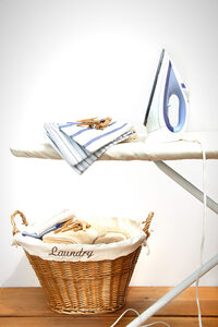 Photo shows an ironing board - some old boards may contain asbestos, covers were also lined with asbestos