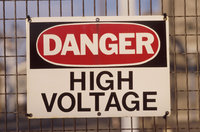 Photo shows a high voltage warning sign