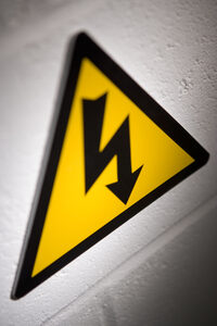 Photo shows a high voltage electricity warning sign